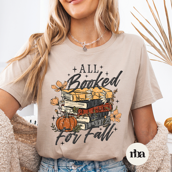 All Booked For Fall reading-themed graphic T-shirt mockup.