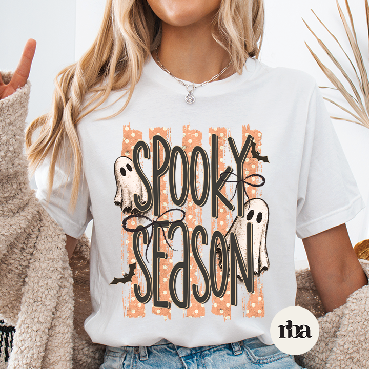 Spooky Season Orange Stripe Halloween graphic T-shirt mockup.