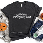 Get In Loser We're Getting Lattes fall graphic T-shirt mockup.