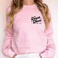 Teach Them To Be Kind graphic sweatshirt